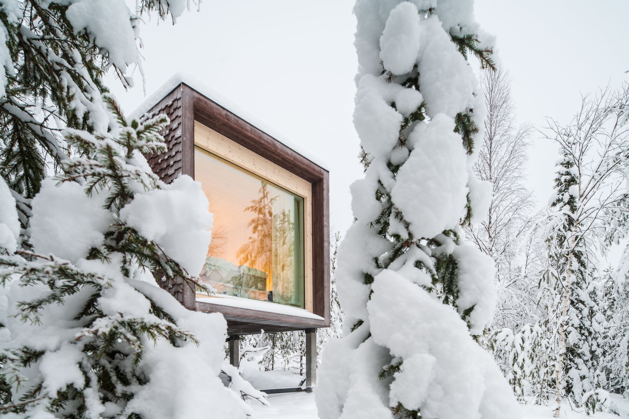 Exterior of Arctic Treehouse in Finnish Lapland during winter