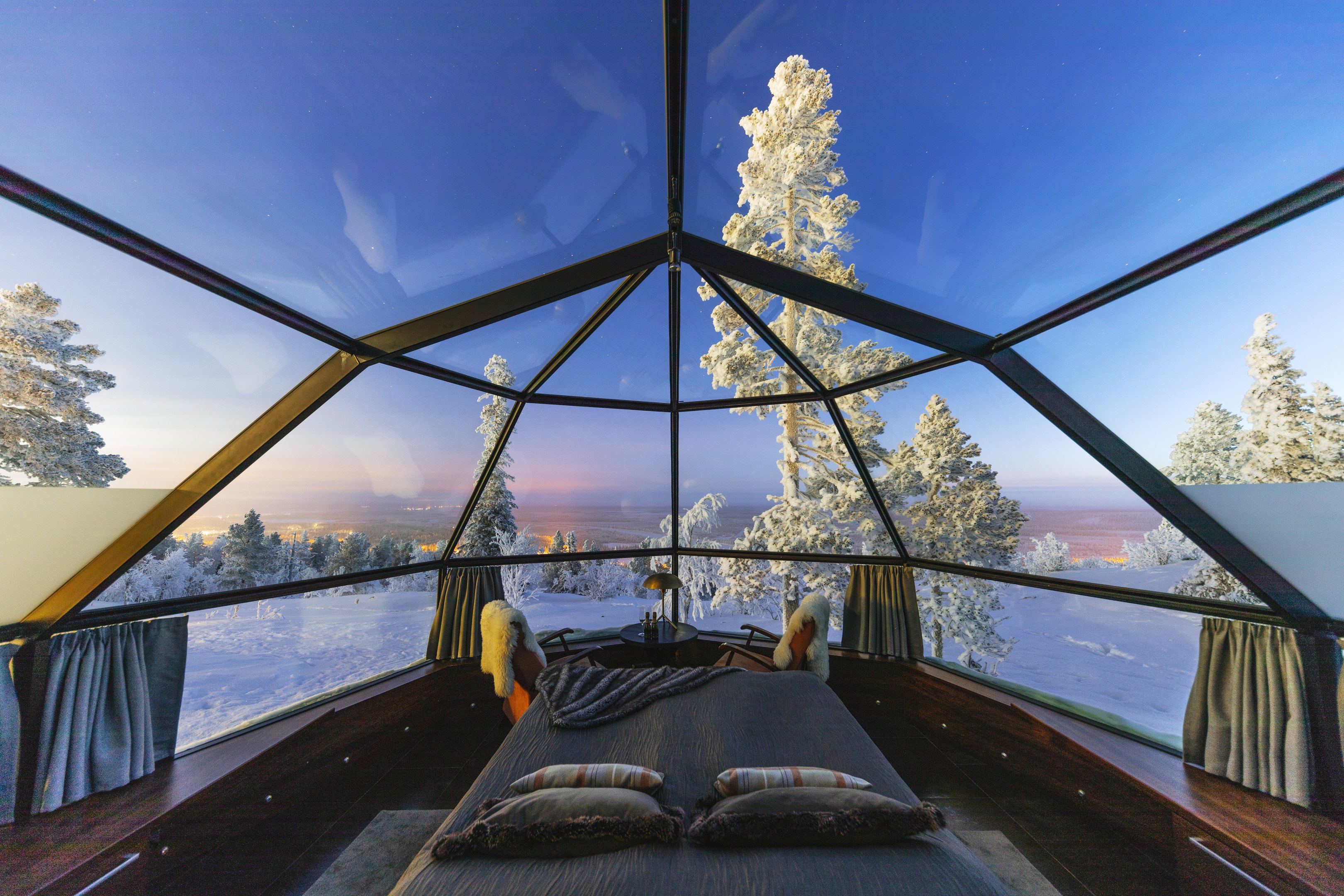 Inside a glass-roof igloo at Levi Iglut, Golden Crown in Finnish Lapland