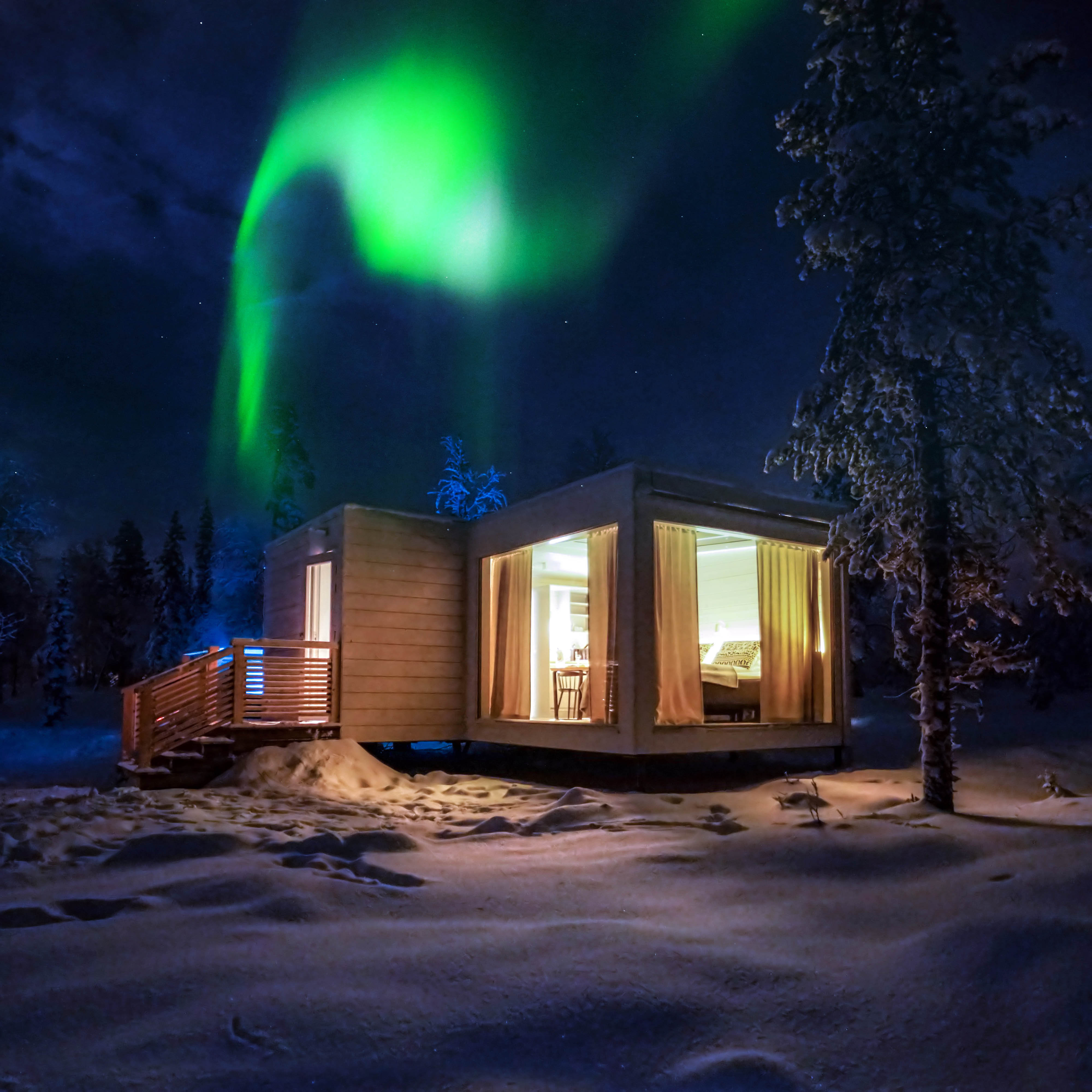 Northern lights outside Sky view cabins at Northern lights ranch in Finland