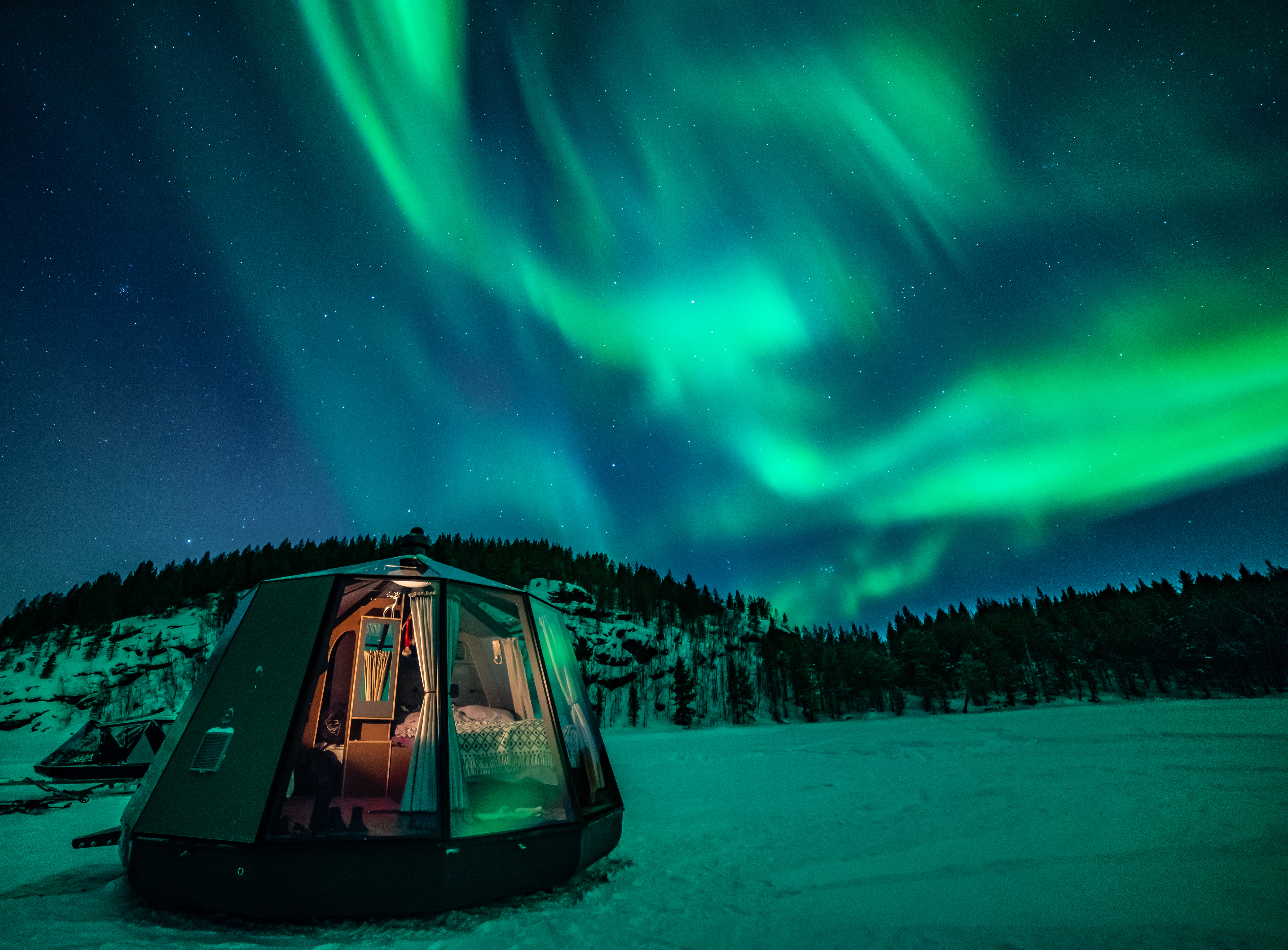 Northern Lights outside Aurora hut at Nangu in Finnish Lapland
